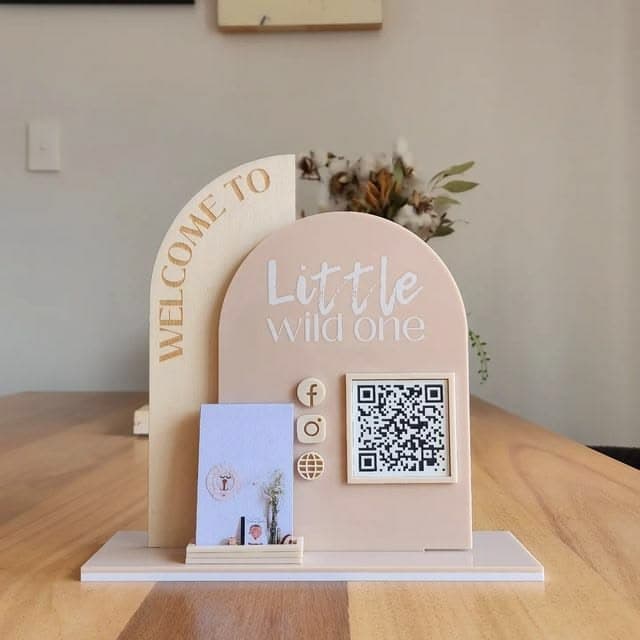 Arched counter display with QR code and card holder